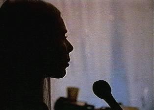 During a performance of the song <i>Mystery Train</i> the stage lights blew out, leaving only one spotlight to light the stage.  As Neil Young performs <i>Helpless</i> Joni is singing background vocals in the shadows from a microphone backstage.