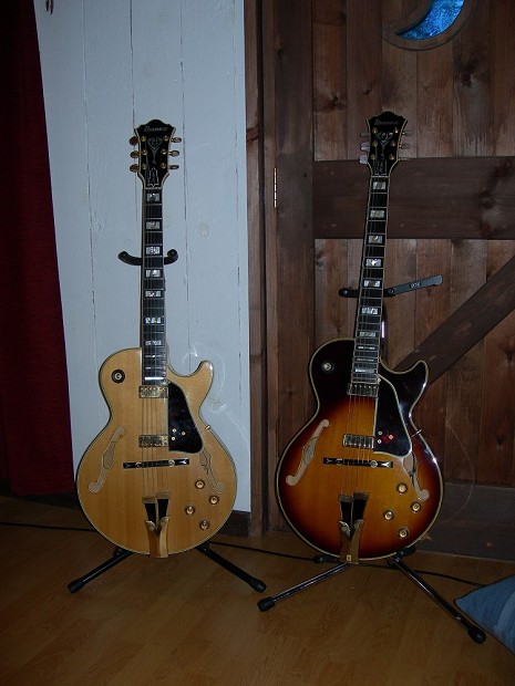 Two of The Refuge of the Roads guitars (one blonde, one sunburst) in Conker Cabin, UK, in October 2006. [anitagabrielle]