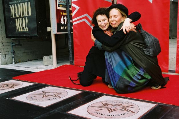 Joni with fellow Inductee Margaret Atwood.