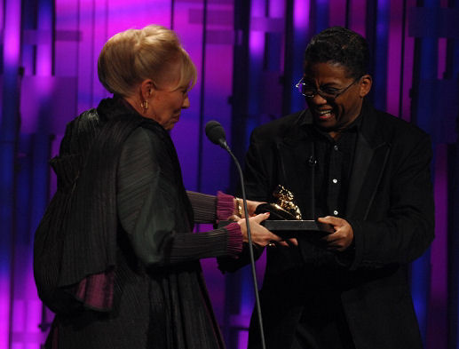 <i>I think I'll just take my award and run now.  Thank you. </i><br>- Joni accepts her award from Herbie Hancock.  