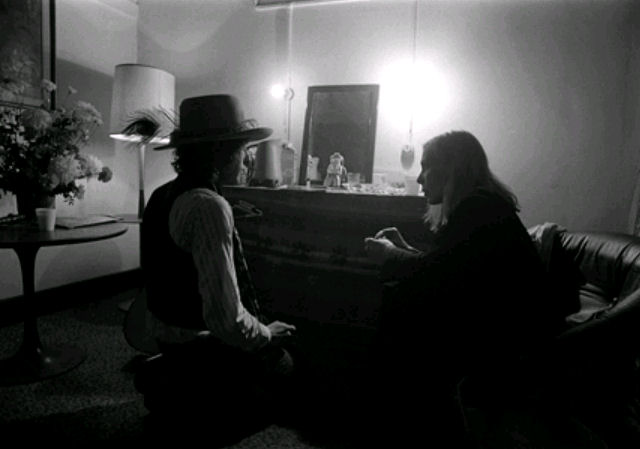 Backstage: Bob Dylan and Joni in Cambridge.<br>
Photo by Ken Regan. 